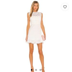 Worn once for my bridal shower! Great little white dress
